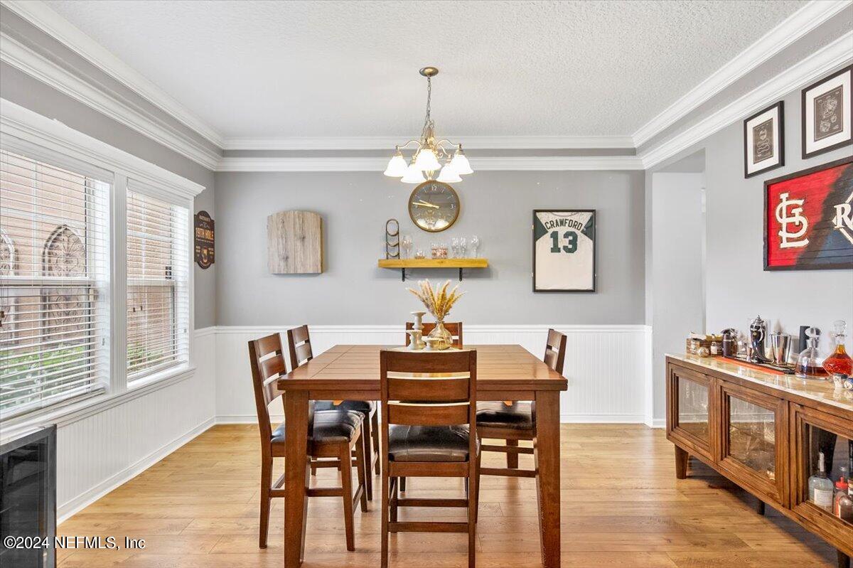 16402 Tisons Bluff Road Jacksonville, FL 32218 - Photo 7 of 45 a dining room with furniture and window