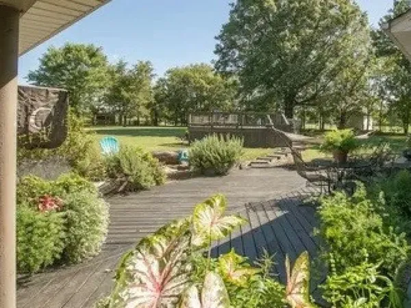 a view of a lake with a yard