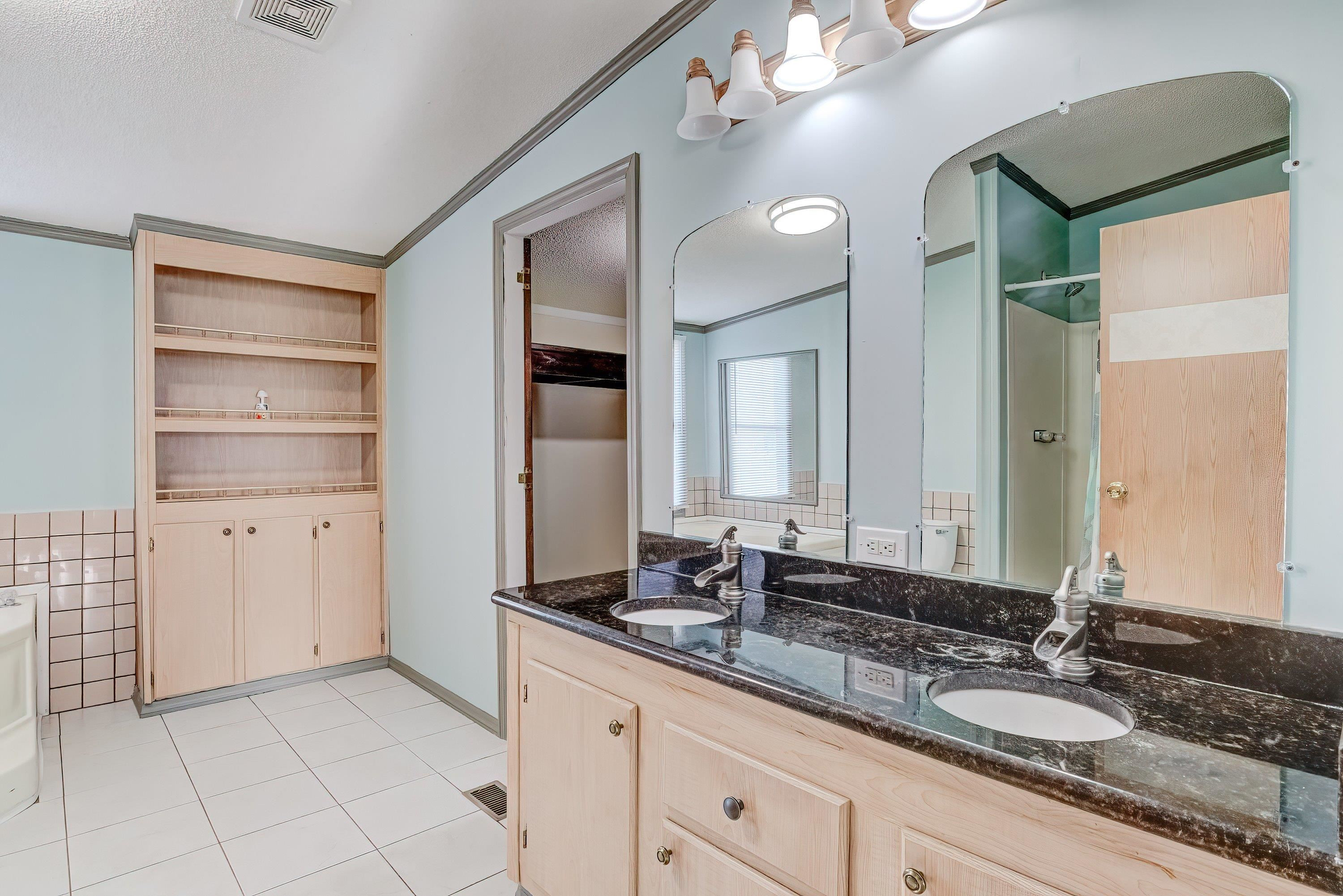 1470 River Run Road Selma, NC 27576 - Photo 26 of 54 Primary Bathroom with corner tub