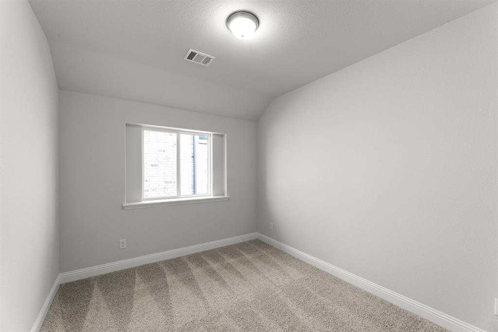 14422 Mietner Street Pilot Point, TX 76258 - Photo 21 of 23 an empty room with a window