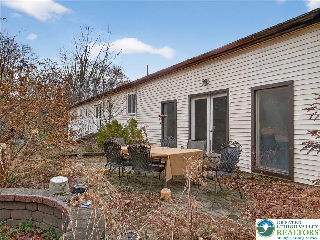 2197 Buck Run Road Quakertown, PA 18951 - Photo 29 of 45 An inviting rear patio provides an ideal setting for outdoor dining and entertaining.