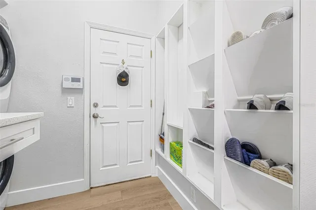 a bathroom with a bathtub sink and mirror