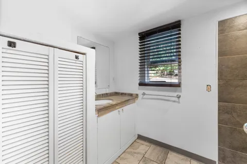 a view of a room that has a window in it