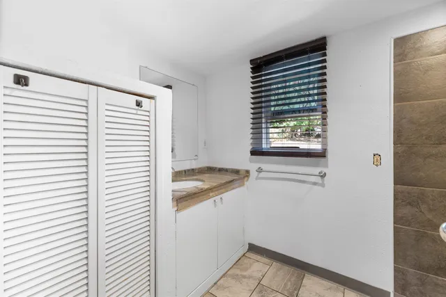 a view of a room that has a window in it