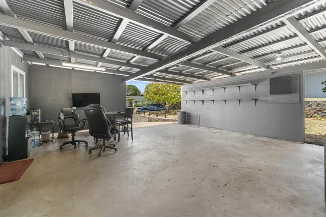 a view of a garage with furniture