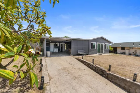 a house with trees in front of it