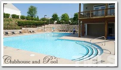 8425 Aztec Dawn Court Raleigh, NC 27613 - Photo 8 of 8 a view of a swimming pool with a yard