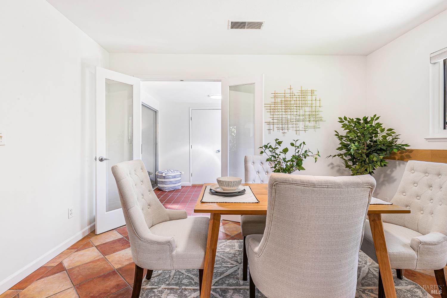 29 Woodgreen Street Santa Rosa, CA 95409 - Photo 13 of 42 a dining room with furniture and wooden floor