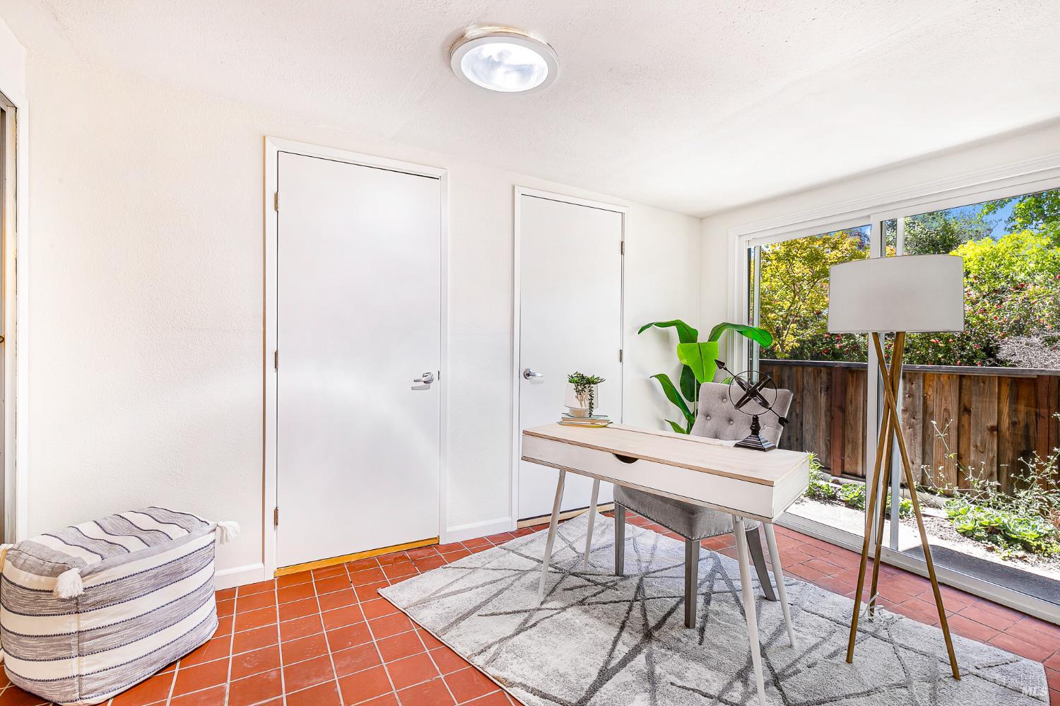 29 Woodgreen Street Santa Rosa, CA 95409 - Photo 14 of 42 a workspace with furniture and a potted plant