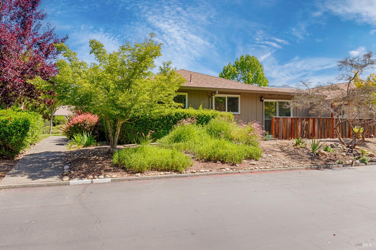29 Woodgreen Street Santa Rosa, CA 95409 - Photo 24 of 42 a front view of a house with a garden and trees
