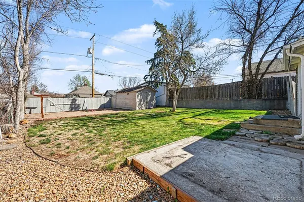 a view of a backyard of a house