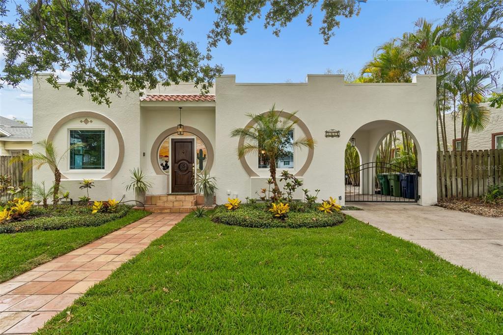 2434 West Prospect Road Tampa, FL 33629 - Photo 2 of 45 a front view of a house with garden