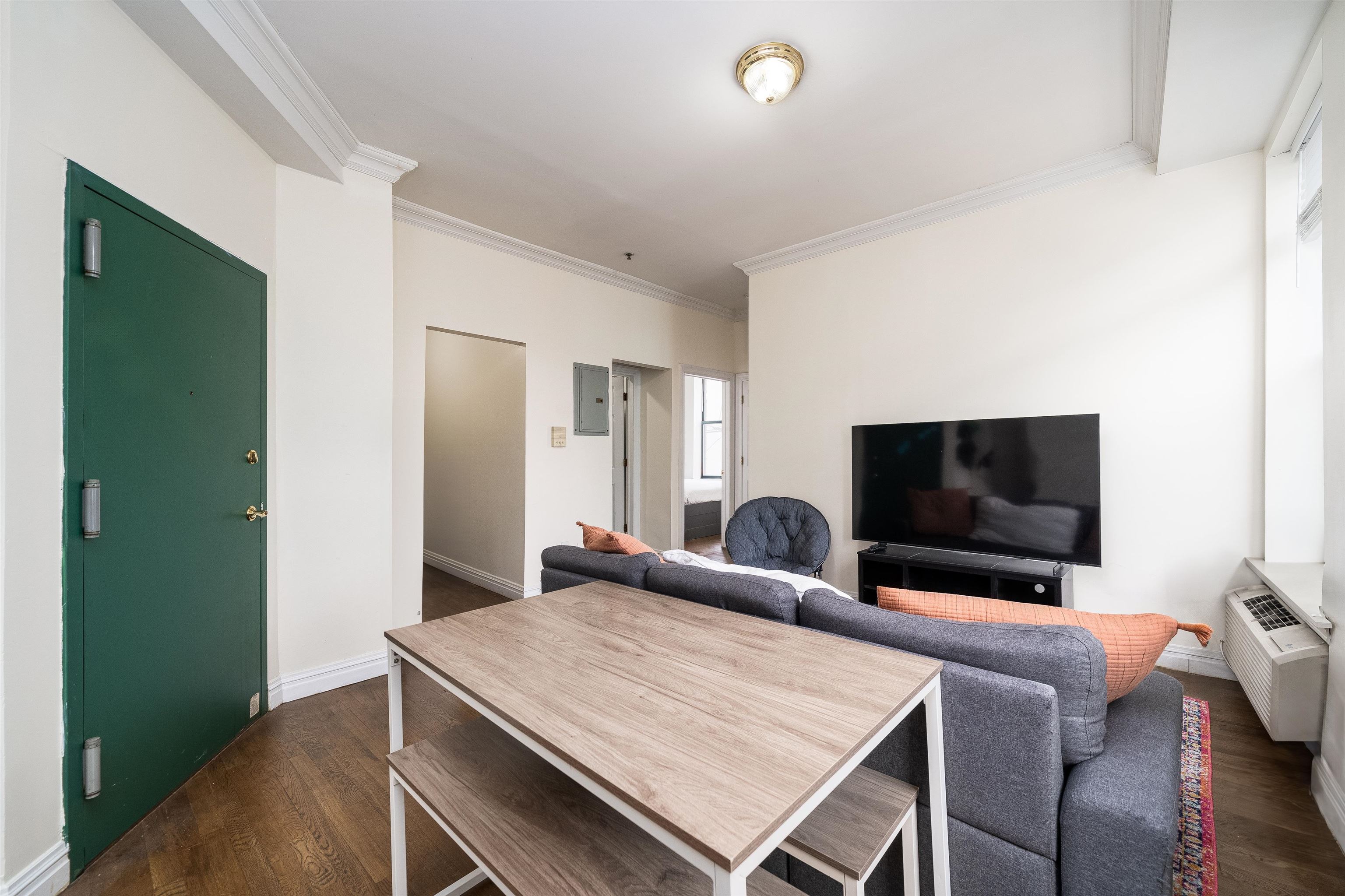 461 4th Street, Unit 3W Hoboken, NJ 07030 - Photo 5 of 12 a view of a livingroom with furniture