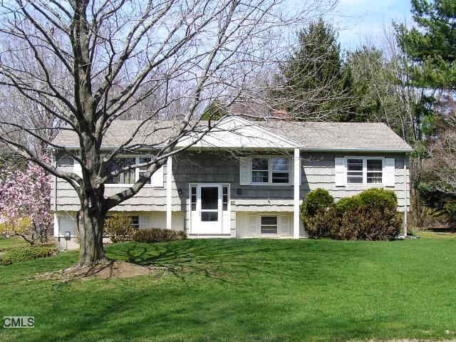 80 Longview Road Monroe, CT 06468 - Photo 1 of 1 a front view of house with yard and green space