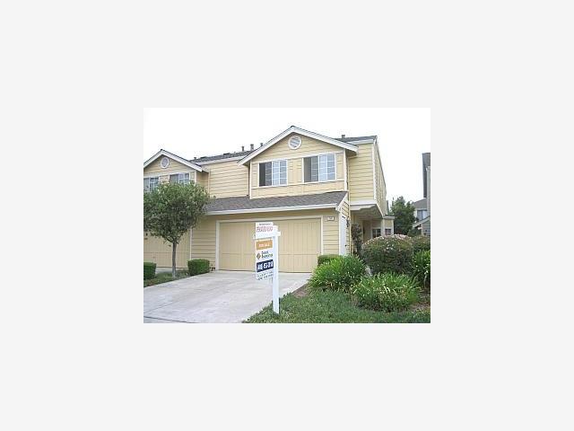 a picture of a house with a large windows