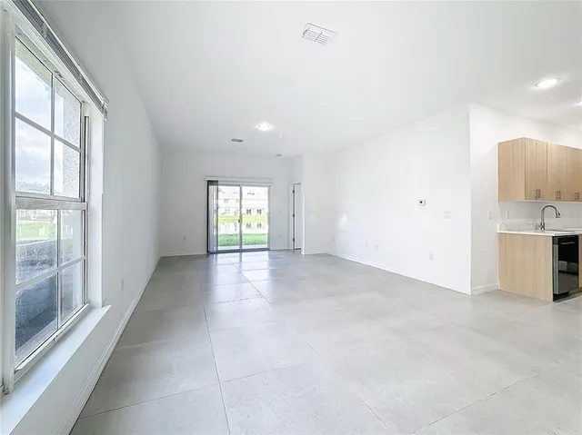 an empty room with windows