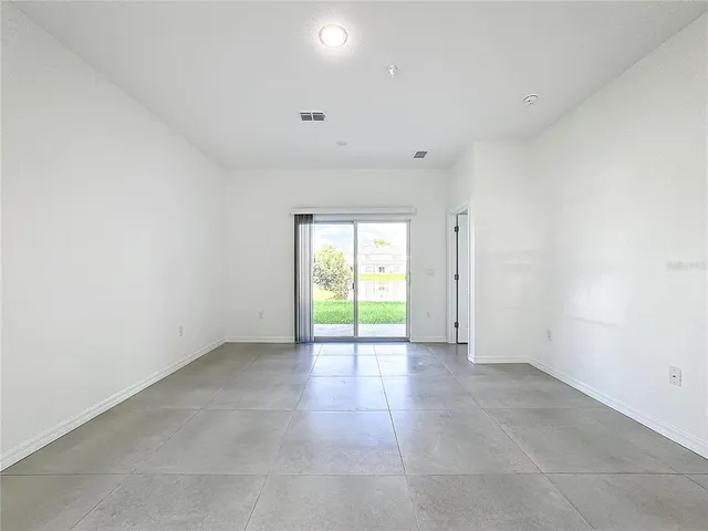 an empty room with an entryway