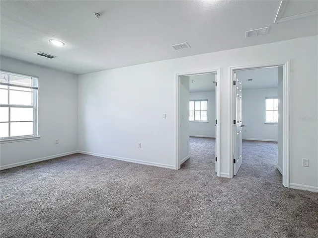 a bathroom with a toilet and a bathtub