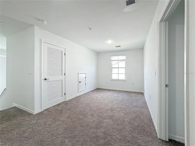 an empty room with closet