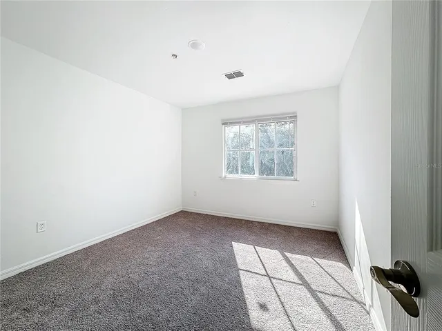 a view of a yard in front of a house