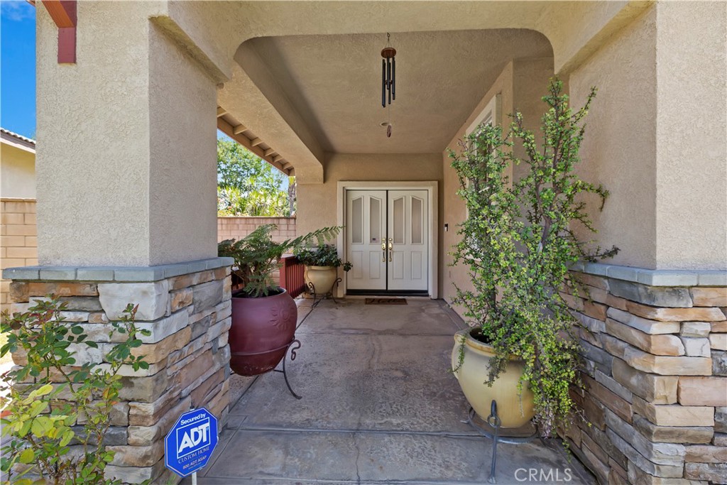 9609 Heartland Place Rancho Cucamonga, CA 91730 - Photo 7 of 48 Covered Patio entry.