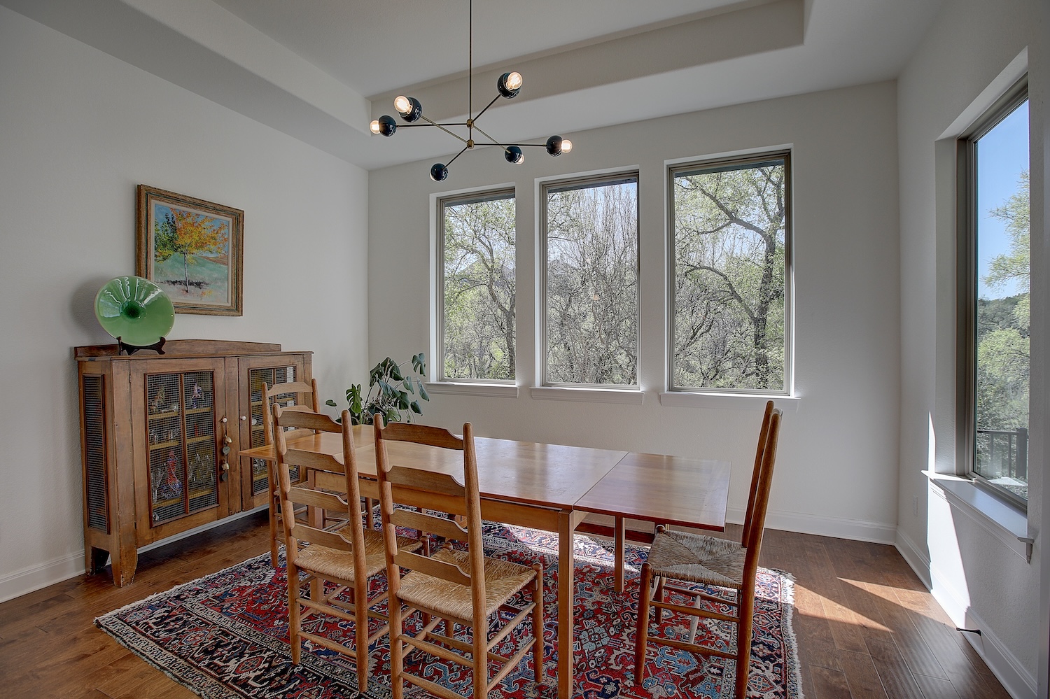 129 Hollytree Court Georgetown, TX 78628 - Photo 21 of 40 a view of a dining room with furniture window and wooden floor