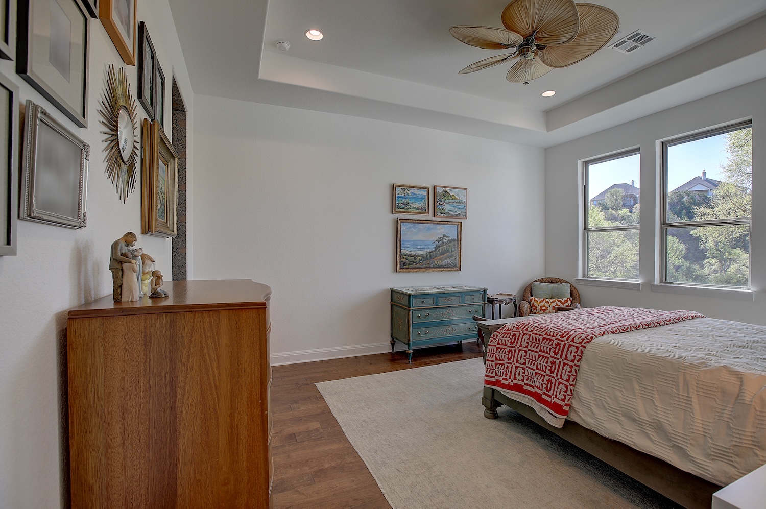 129 Hollytree Court Georgetown, TX 78628 - Photo 29 of 40 Spacious primary bedroom is located in the back corner of the home or peace and serentiy