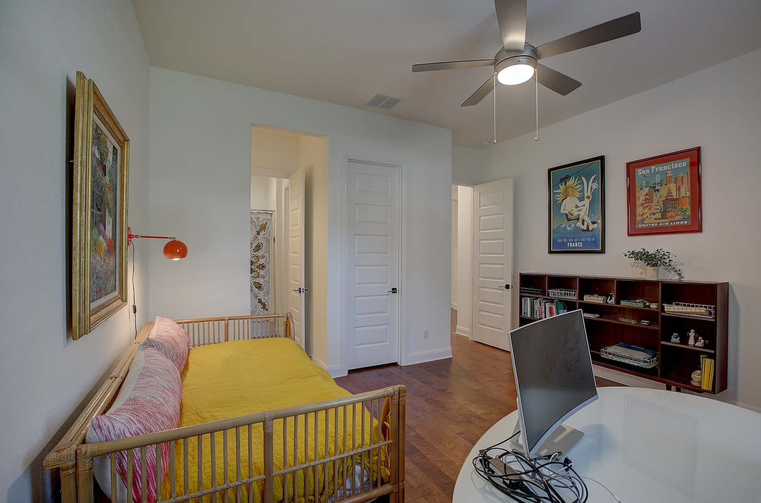 129 Hollytree Court Georgetown, TX 78628 - Photo 32 of 40 a bedroom with furniture and wooden floor