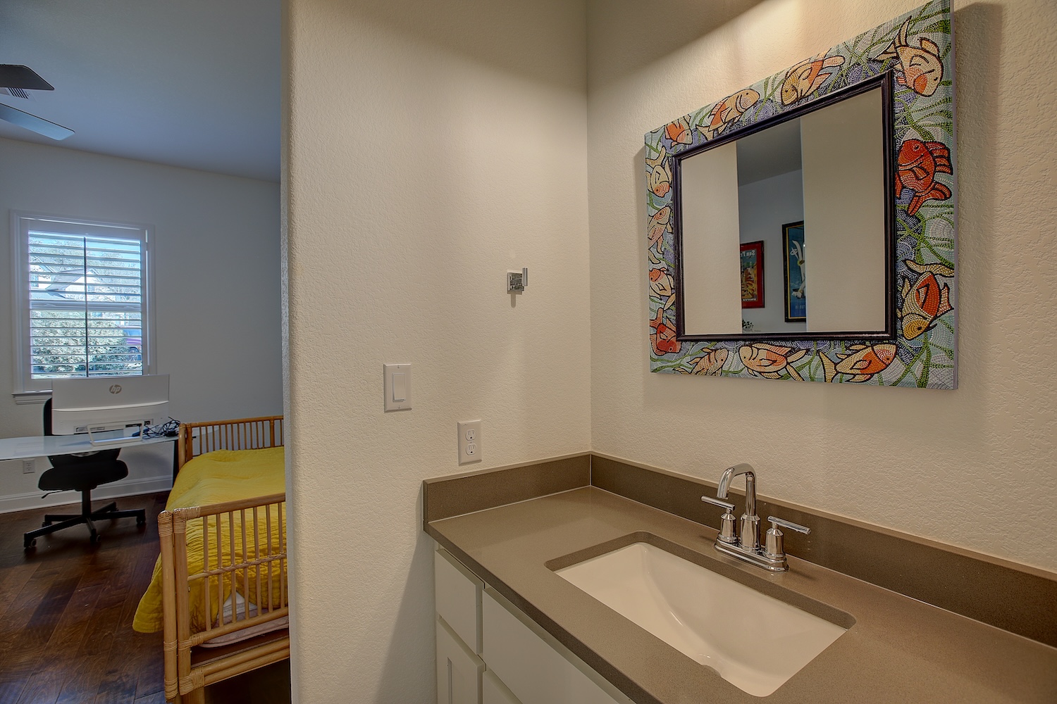 129 Hollytree Court Georgetown, TX 78628 - Photo 33 of 40 a bathroom with a sink and a mirror