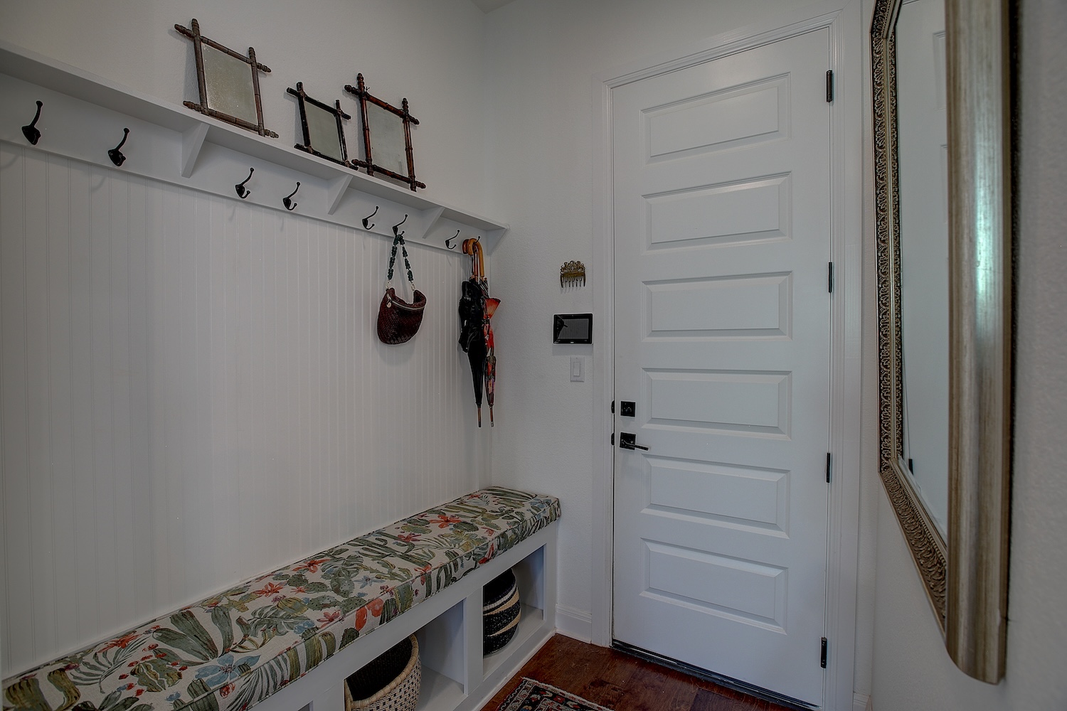 129 Hollytree Court Georgetown, TX 78628 - Photo 38 of 40 Entry from garage has been set up for a convenient Drop Zone to store shoes, purses, backpacks, and the like. convenient, attractive, and useful.