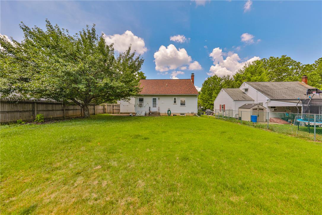 3050 Cornwall Road Bethlehem, PA 18017 - Photo 74 of 80 A spacious backyard with mature trees offers ample room for outdoor activities.