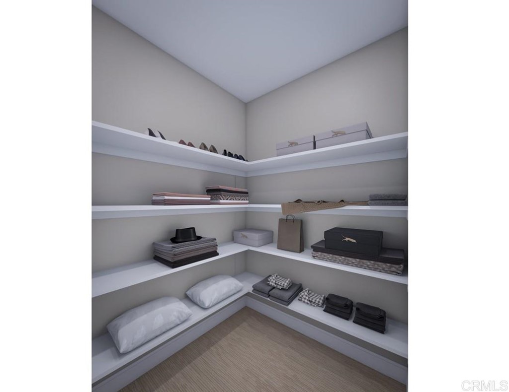 5140 Lighthouse Bend San Diego, CA 92130 - Photo 11 of 24 a kitchen with a stove and white cabinets