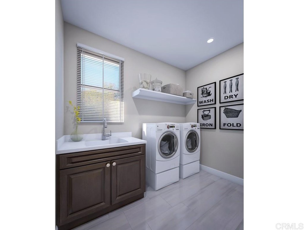 5140 Lighthouse Bend San Diego, CA 92130 - Photo 13 of 24 a utility room with dryer and washer