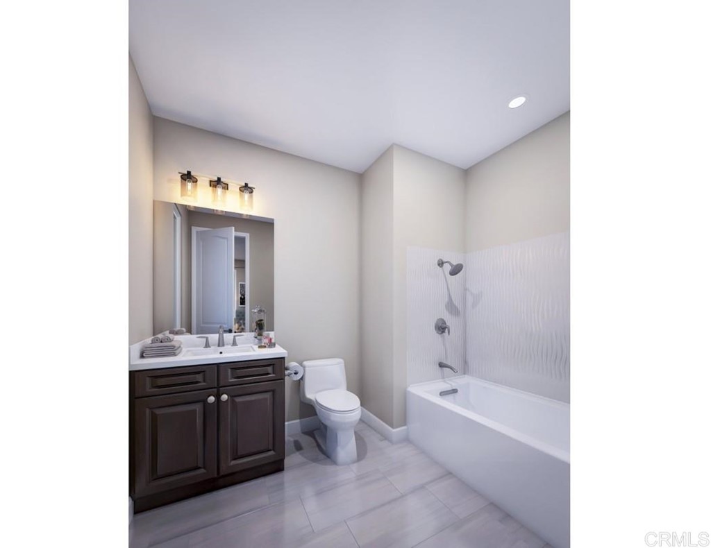 5140 Lighthouse Bend San Diego, CA 92130 - Photo 16 of 24 a bathroom with a bathtub sink mirror and toilet