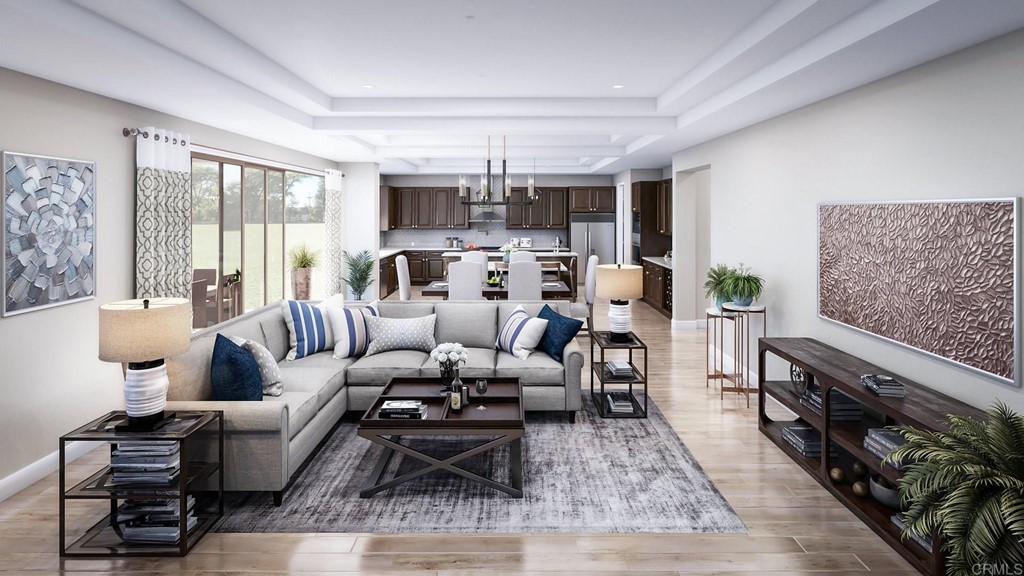 5140 Lighthouse Bend San Diego, CA 92130 - Photo 6 of 24 a living room with furniture and a wooden floor
