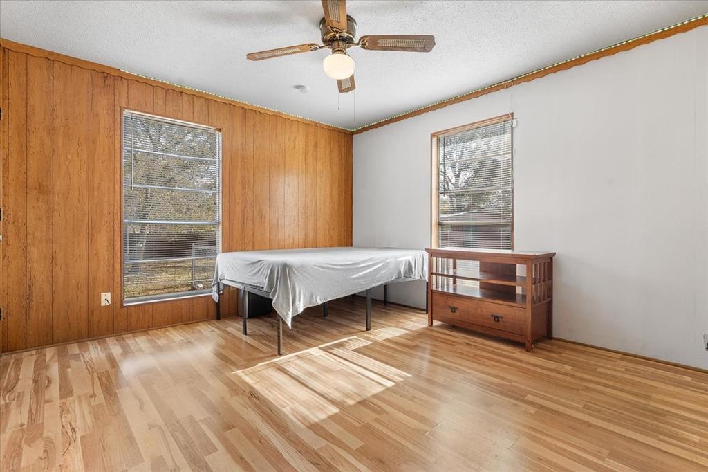 519 Tolson Avenue Van Alstyne, TX 75495 - Photo 18 of 25 a bedroom with a bed and a window