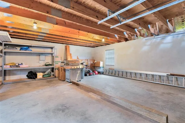 a view of an house with backyard and swimming pool