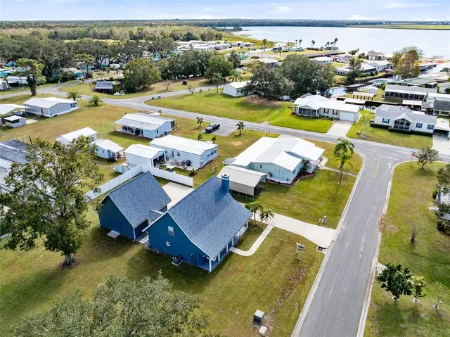 an aerial view of residential building with ocean view