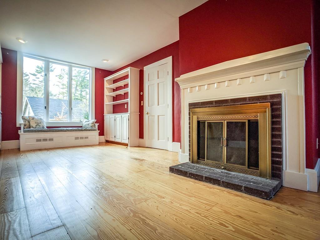678 Point Road Marion, MA 02738 - Photo 3 of 33 a view of livingroom with fireplace wooden floor and window