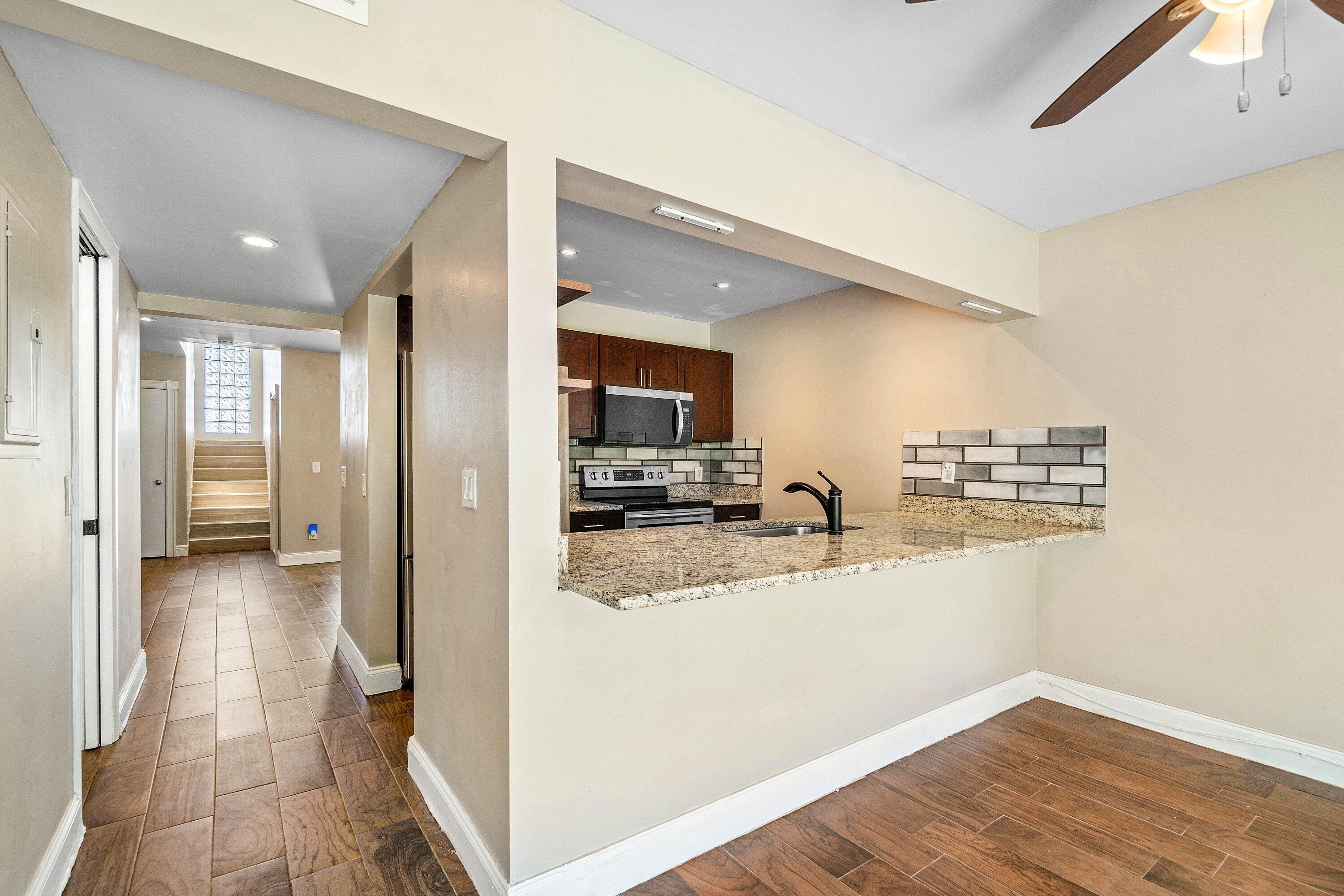 5090 Elmhurst Road, Unit E West Palm Beach, FL 33417 - Photo 9 of 21 007-5090ElmhurstRoad-WestPalmBeach-FL-33