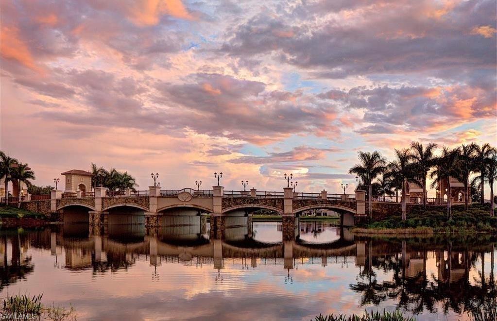 9511 Napoli Lane, Unit 202 Naples, FL 34113 - Photo 36 of 50 a view of a chairs and table in a patio