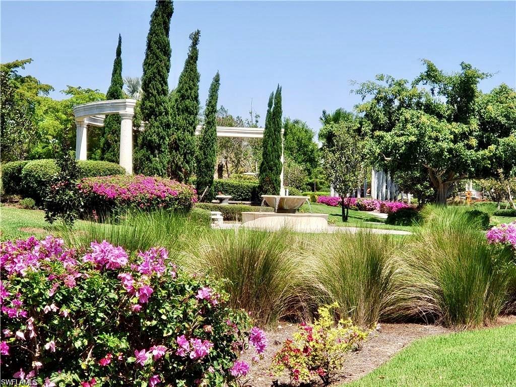 9511 Napoli Lane, Unit 202 Naples, FL 34113 - Photo 39 of 50 a view of a flower in a garden