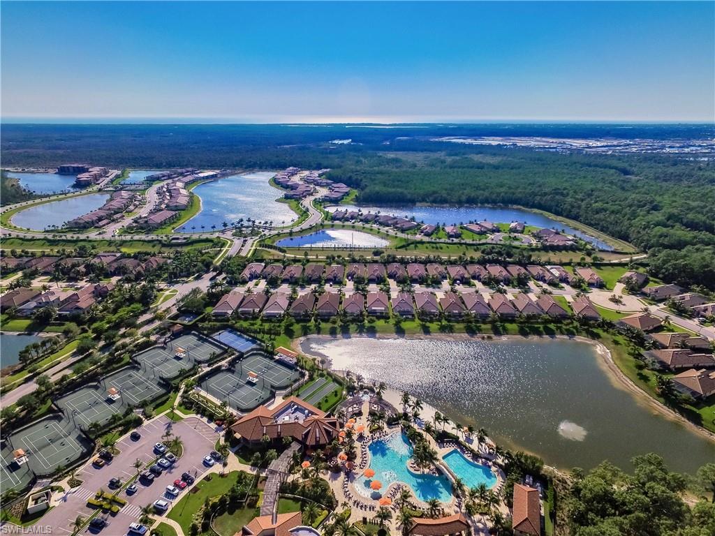 9511 Napoli Lane, Unit 202 Naples, FL 34113 - Photo 50 of 50 an aerial view of residential houses with outdoor space