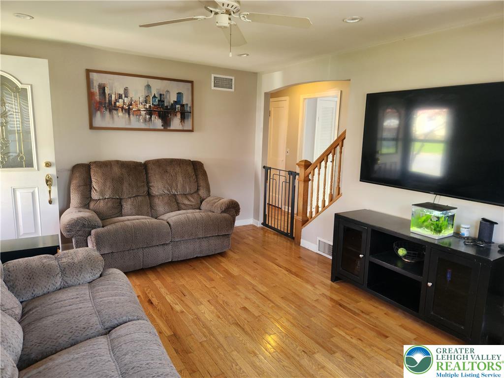 18 George Avenue Nazareth, PA 18064 - Photo 2 of 15 a living room with furniture and a flat screen tv