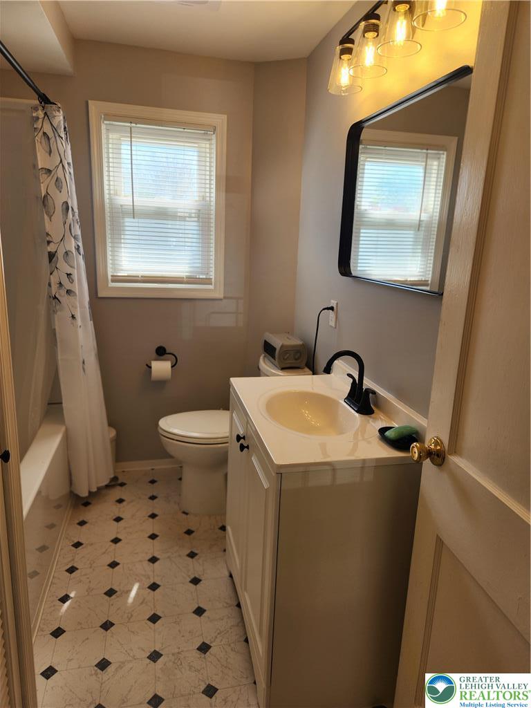 18 George Avenue Nazareth, PA 18064 - Photo 9 of 15 a bathroom with a sink a toilet a window and vanity