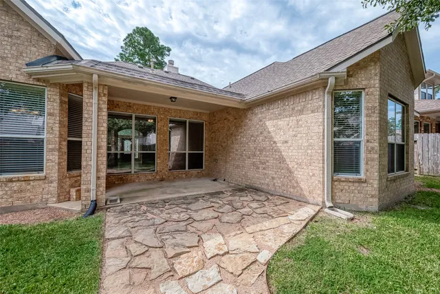 a view of a yard with tree s