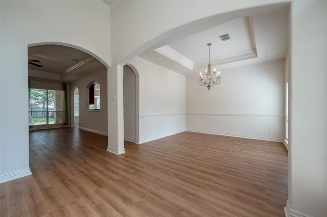 a view of a livingroom with wooden floor