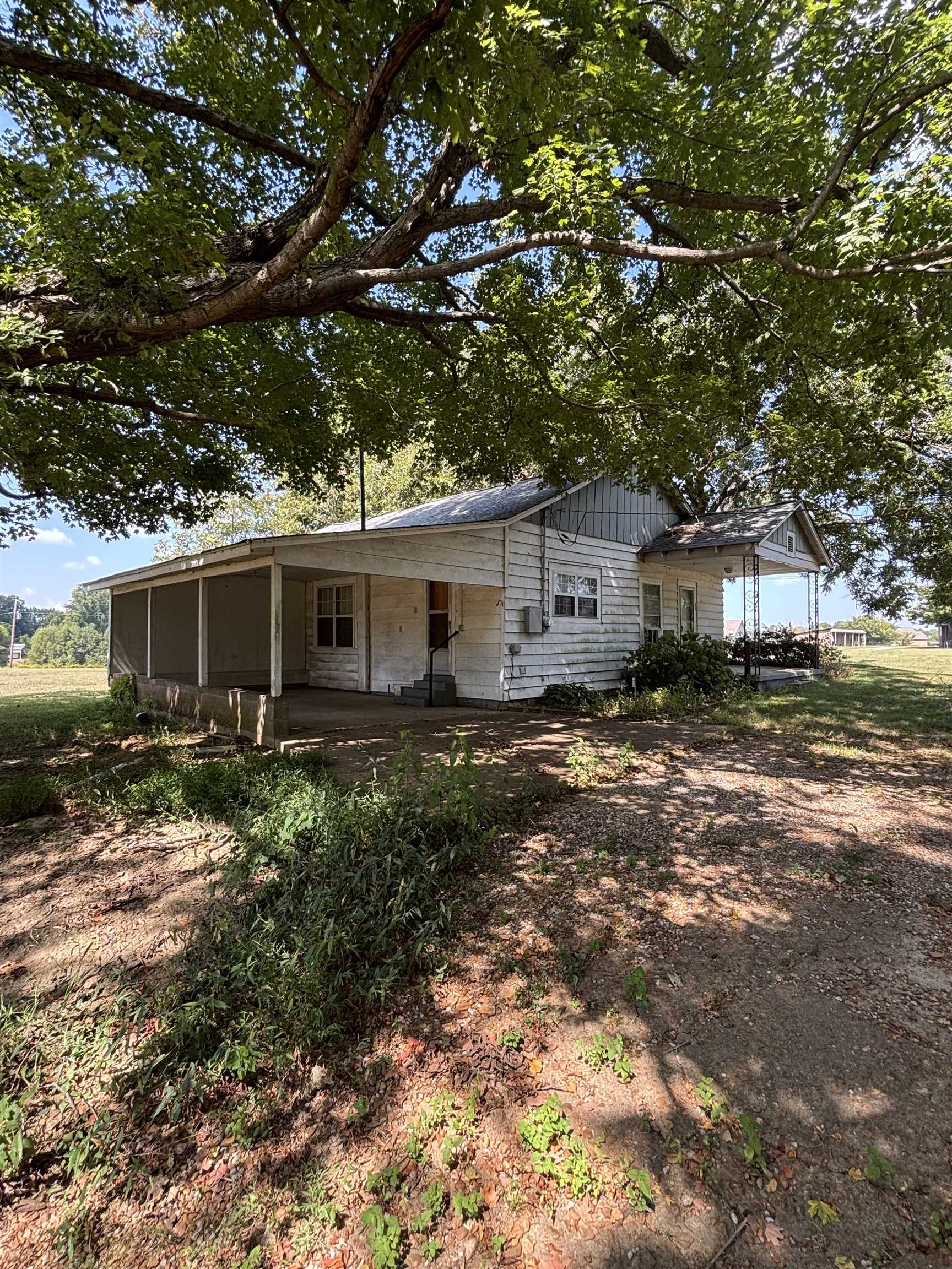181 Deen Road Brighton, TN 38011 - Photo 8 of 16 Rear view of house featuring covered porch