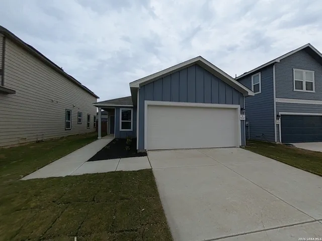 a front view of house with yard