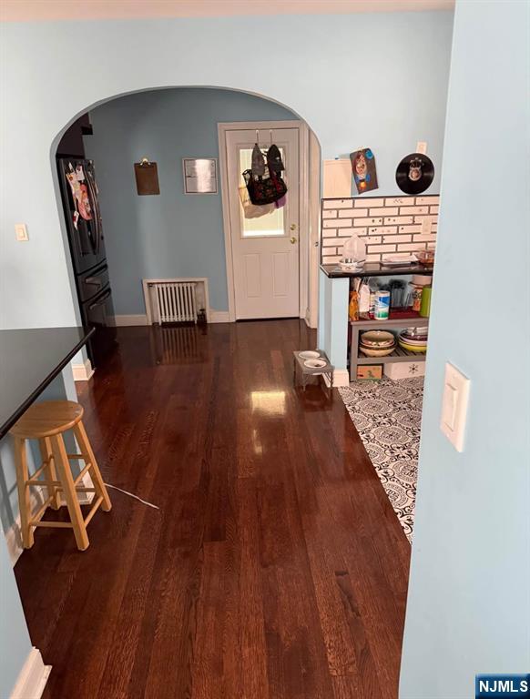 380 Semel Avenue Garfield, NJ 07026 - Photo 4 of 19 a living room with furniture and wooden floor